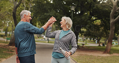 Buy stock photo High five, senior couple and park for fitness goals, happy for wellness win with workout and bottle for water. Success, support and exercise, man and woman for retirement bonding outdoor with drink