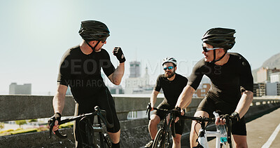 Buy stock photo Bike, city and fist pump with sports people on bridge together for exercise or fitness motivation. Celebration, cycling and group of athlete friends outdoor in town for health or workout support