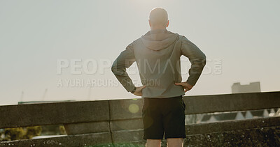 Buy stock photo Sky, back and fitness for person, bridge and routine for athlete, fresh air and healthy for marathon. Outdoor, summer and runner in morning, lens flare and wellness with jog, city and workout