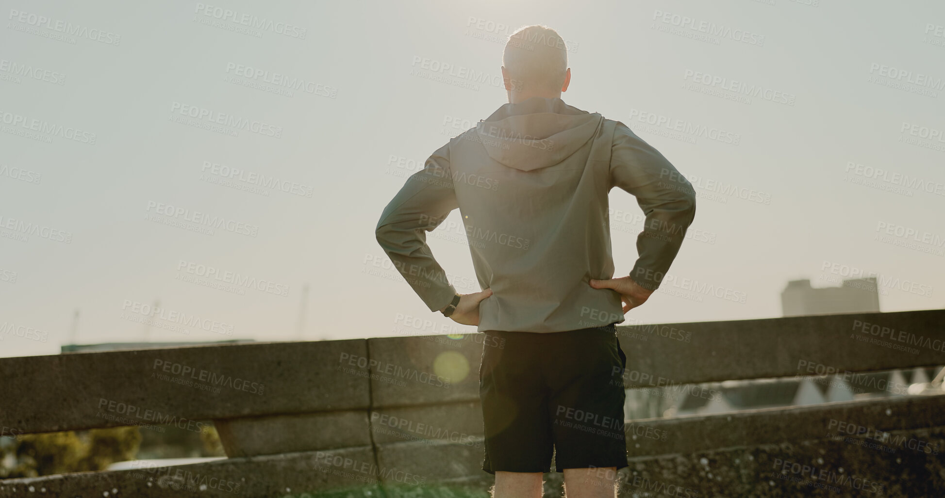 Buy stock photo Sky, back and fitness for person, bridge and routine for athlete, fresh air and healthy for marathon. Outdoor, summer and runner in morning, lens flare and wellness with jog, city and workout