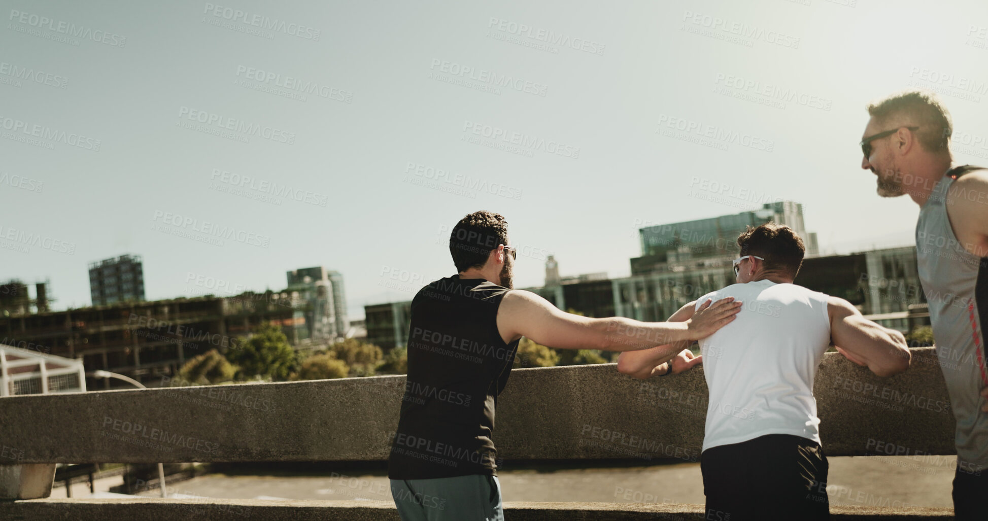 Buy stock photo Break, back and friends in morning, fitness and bonding with routine, bridge and exercise for men. Lens flare, outdoor and free time for workout, healthy and people in city, weekend and together