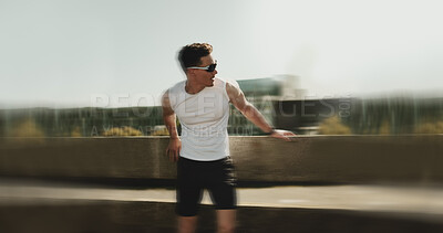 Buy stock photo Motion blur, running and tired with man in city for vertigo, fitness and training fatigue. Dehydration, workout and marathon challenge with person and outdoors for speed, mental health and athlete