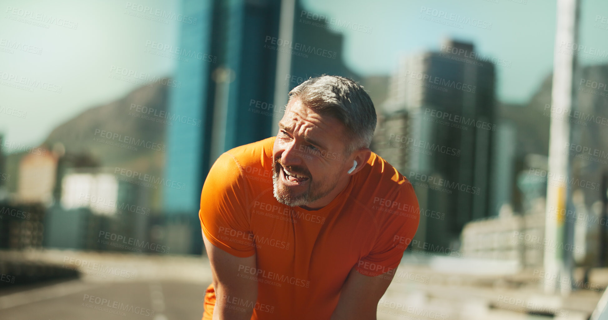 Buy stock photo Fitness, tired and man in city, exercise and exhausted with challenge, workout and healthy. Mature person, outdoor and runner with training, buildings and break with fatigue, sweating and athlete