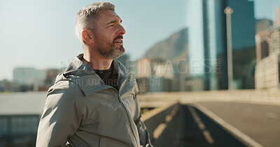 Buy stock photo Mature man, fitness and thinking on bridge with break for race, running challenge and marathon training. Breathe, exhausted and male athlete with cardio exercise or workout on city road with fatigue