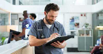 Buy stock photo Tablet, man and surgeon in hospital with telehealth, research or feedback for postop care. Digital technology, reading and male healthcare worker with online surgery or treatment plan in clinic.