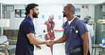 Men, doctors and handshake for greeting at hospital of surgery partnership, healthcare welcome and b2b deal. People, surgeon and agreement with procedure opportunity, medical onboarding and promotion