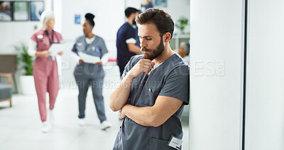 Buy stock photo Stress, man and doctor in hospital with healthcare mistake, crisis or risk with failure in career. Upset, tired and professional male medical worker with patient loss, burnout or exhaustion at clinic