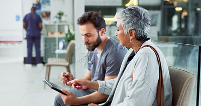 Buy stock photo Doctor, healthcare and tablet with old woman in hospital for results, meeting and consulting. Support, advice and digital report with people talking for medical exam, life insurance and patient