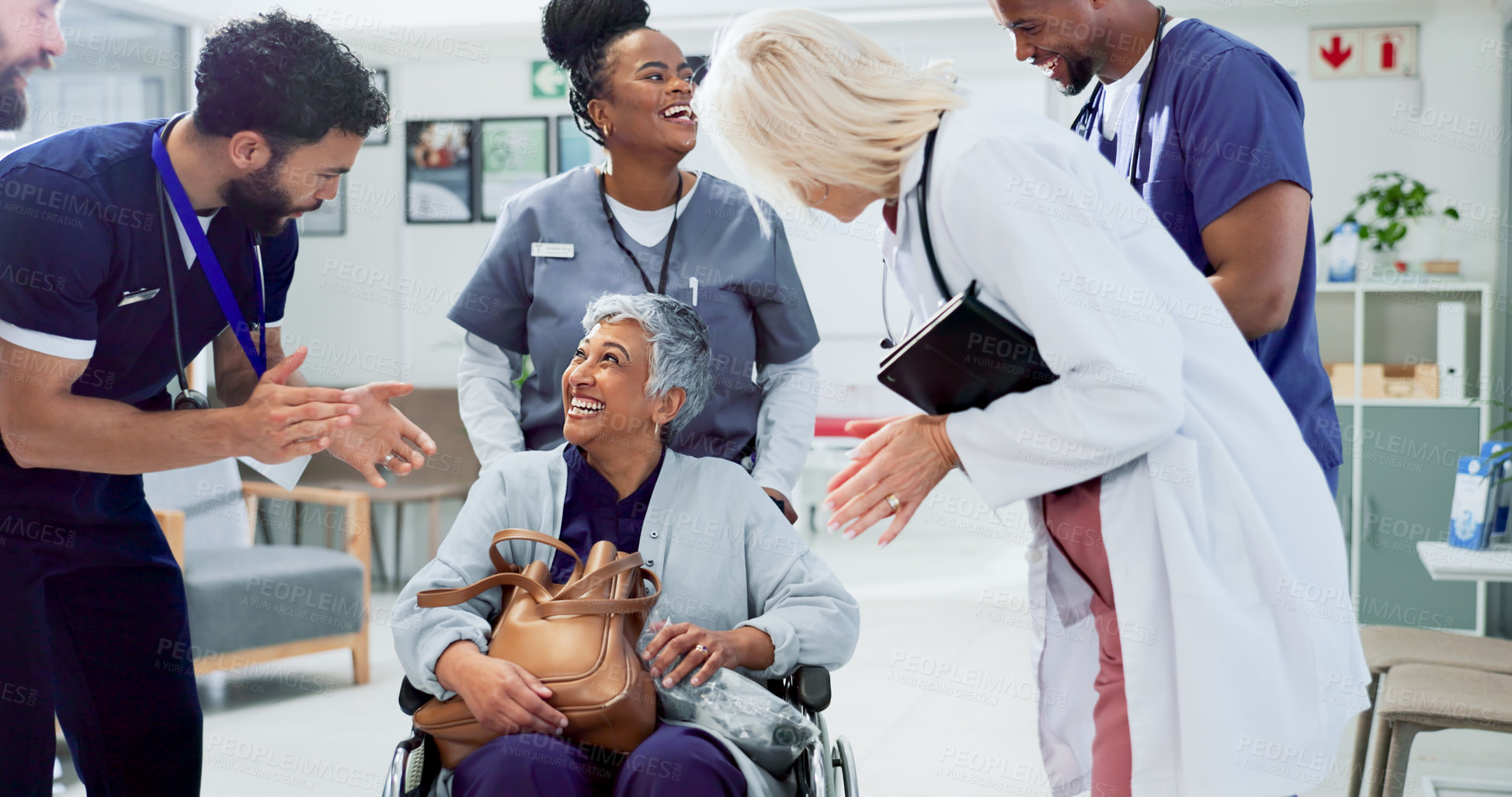 Buy stock photo Applause, medical staff and woman in wheelchair for recovery, healing and surgery success in hospital. Excited people, senior patient and clapping in lobby for support, healthcare and rehabilitation