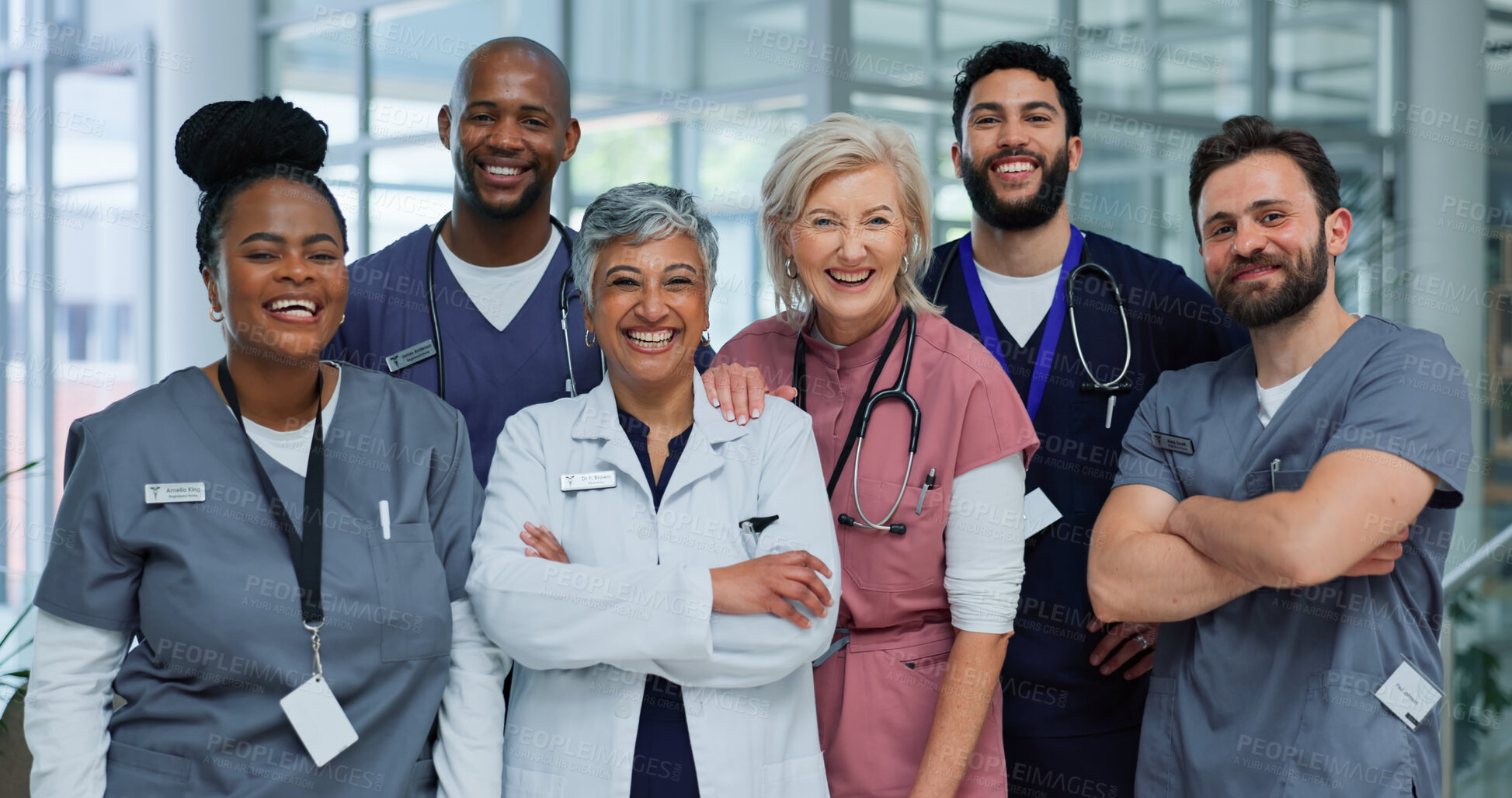 Buy stock photo Portrait, diversity and doctors in hospital, group and confidence with happiness. Employees, medical and professional in clinic, career ambition and smile with uniform, healthcare and teamwork