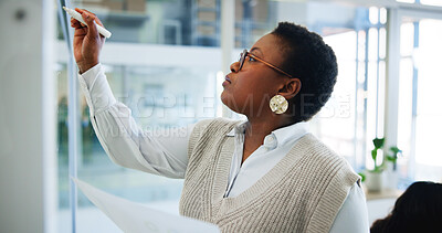 Buy stock photo Black woman, writing and schedule planning with glass board for project management or tasks at office. African, female person or employee taking notes for agenda, brainstorming or ideas at workplace