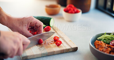 Buy stock photo Hands, knife and tomato on cutting board in home with salad, cooking and meal prep for wellness in morning. Person, fruit and cucumber for nutrition, benefits and food for gut health at apartment