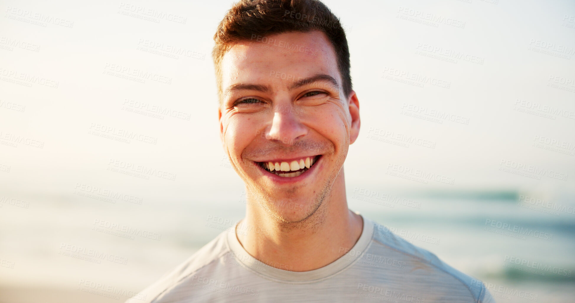 Buy stock photo Man, portrait and beach sand for vacation, travel and outdoor for peaceful waves in nature. Male person, happy and weekend trip for calm adventure on tropical island, relax and earth for freedom