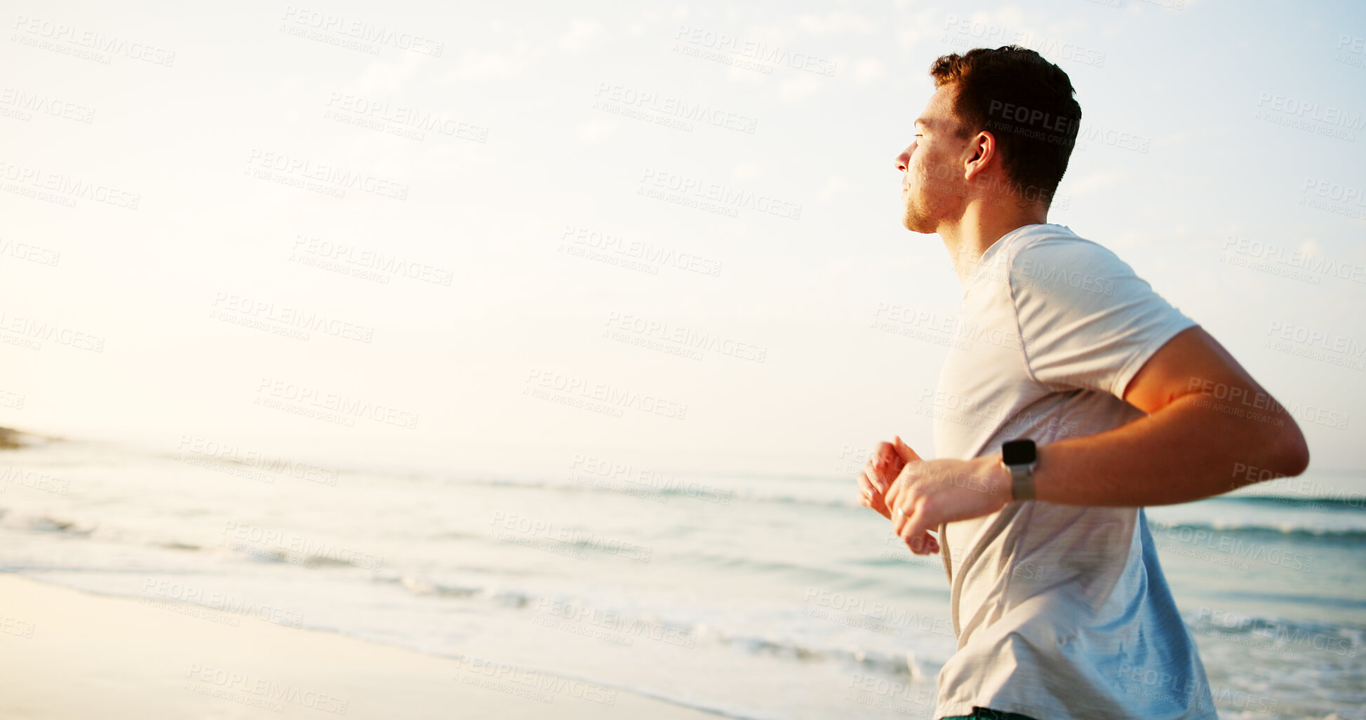 Buy stock photo Fitness, man and running on beach space for exercise, wellness and endurance training. Runner, cardio workout and athlete at ocean with energy, physical health and resilience at seaside in California