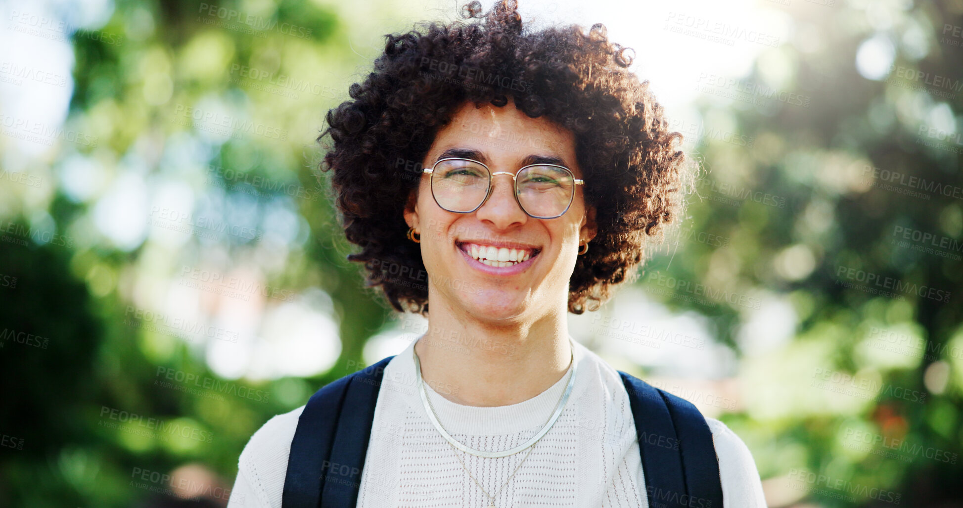 Buy stock photo Man, student and happy for portrait at park, pride and excited on commute to university in spring. Person, smile and backpack on path for scholarship, learning or education at college in Costa Rica