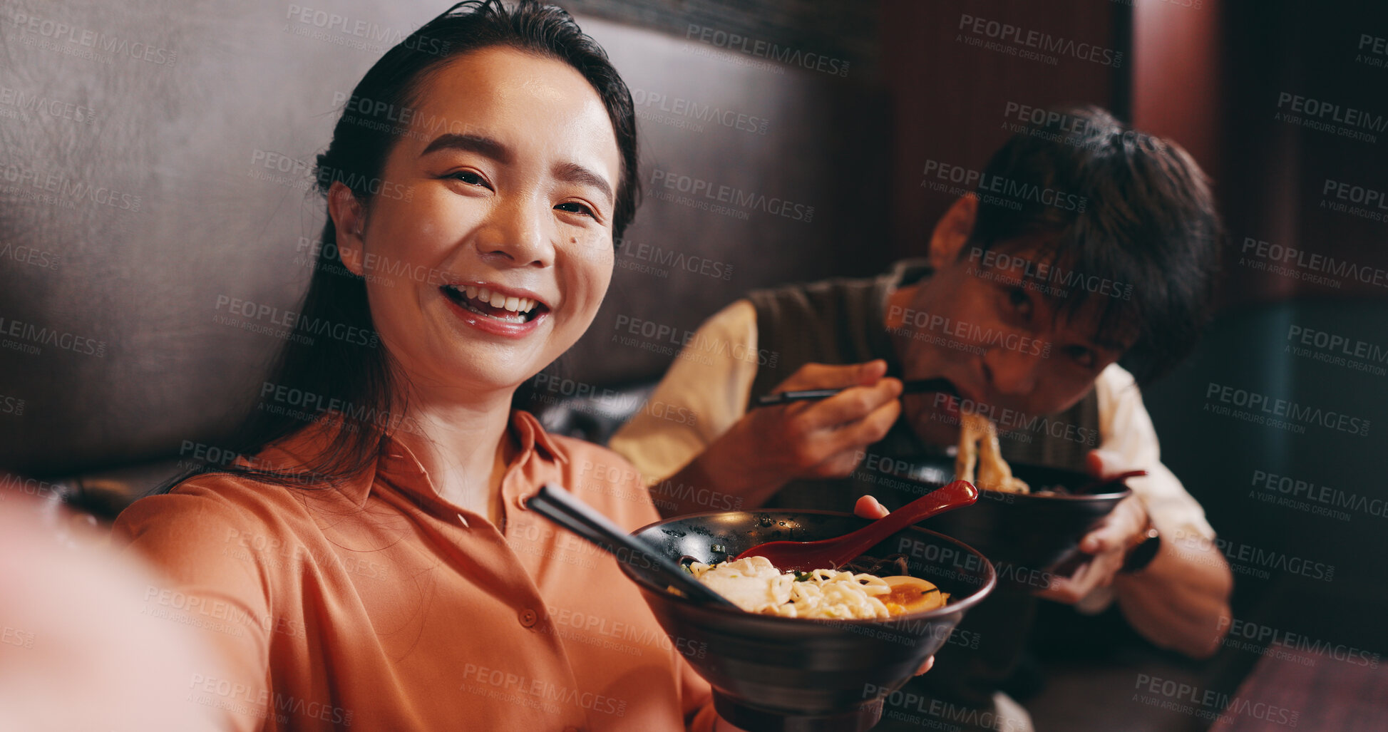Buy stock photo Selfie, couple and portrait with food in restaurant, bonding and celebrate for anniversary with nutrition. Japanese people, man and woman with smile for photography, picture or eating noodles on date