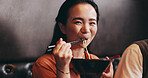 Japanese woman, eating and portrait in restaurant for date, bonding together and healthy meal. Happy people, hospitality and diet with traditional cuisine, chopsticks and ramen noodles as asian food