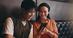 Japanese, couple and happy with mobile for restaurant, online menu and website with conversation. Valentines day, man and woman with phone application for digital order, options and bonding on date