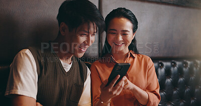 Buy stock photo Japanese, couple and happy with mobile for restaurant, online menu and website with conversation. Valentines day, man and woman with phone application for digital order, options and bonding on date