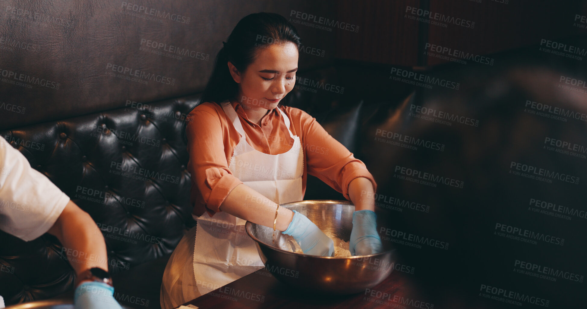 Buy stock photo Cooking, food and mixing with Japanese woman in restaurant for catering, bowl and fine dining. Dinner menu, nutrition and chef with Asian person in class for meal prep, culture and traditional diet 