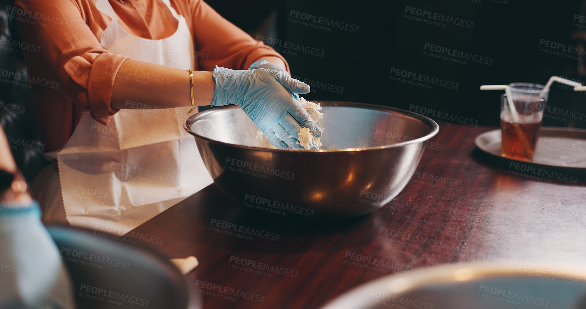 Buy stock photo Hands, bowl and cooking class for ramen noodles, meal prep and chef in Japanese restaurant for lunch. Female person, kneading dough in shop for hospitality, diet and healthy food for culinary skill