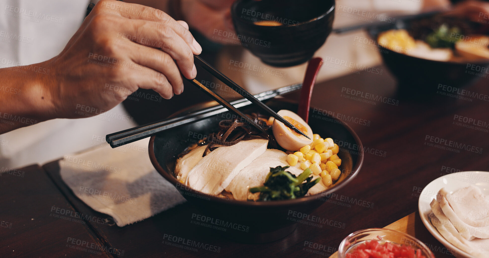 Buy stock photo Restaurant, hands and person with food for Japanese culture, culinary chopsticks and nutrition bowl. Closeup, customer and catering with healthy meal of noodles, ramen and vegetables for dining dish