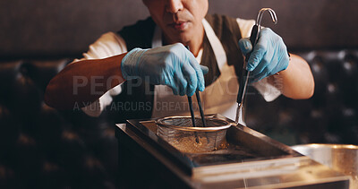 Buy stock photo Japanese restaurant, cooking and hands preparing noodles for traditional cuisine, culinary culture and lunch meal. Chef, gloves and person steaming ramen in appliance for nutrition and healthy dinner