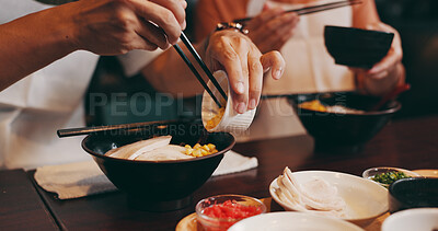 Buy stock photo Couple, hands and eating with chopsticks in restaurant for healthy meal, ramen bowl and serving corn vegetables. Japanese people, noodles and food for traditional cuisine, lunch diet and gourmet dish