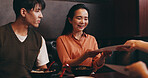 Date, menu and food with Japanese couple in restaurant for dinner, nutrition and hospitality. Fine dining cuisine, gourmet and meal with asian man and woman eating in cafe for waiter, lunch and dish