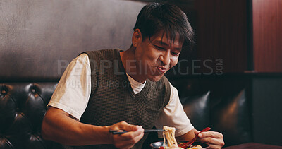 Buy stock photo Eating, noodles and Japanese man at restaurant with food, ramen and lunch with smile. Hungry, table and bowl with meal, asian cuisine and customer with chopsticks and health dish for nutrition