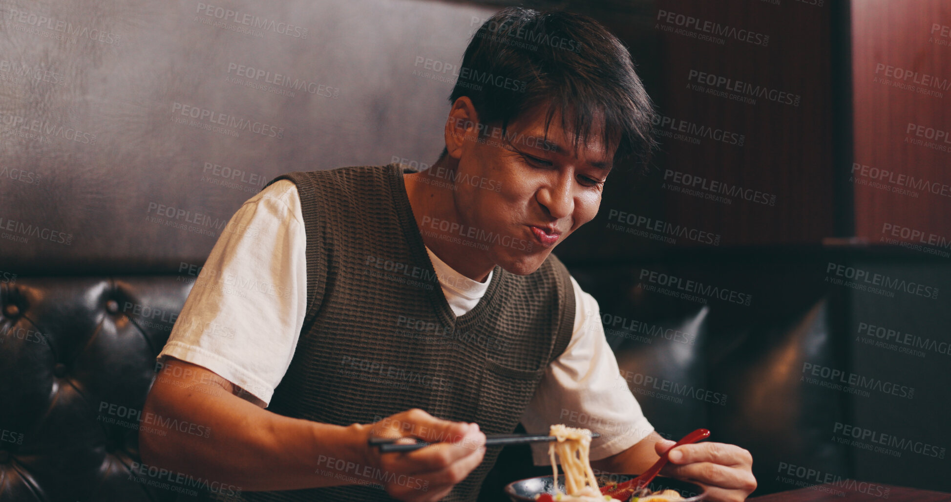 Buy stock photo Eating, noodles and Japanese man at restaurant with food, ramen and lunch with smile. Hungry, table and bowl with meal, asian cuisine and customer with chopsticks and health dish for nutrition