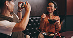 Couple, food and photo on date in restaurant for happy memory, profile picture update and social media post. Japanese people, ramen bowl and smile with video recording in cafe for bonding and dining