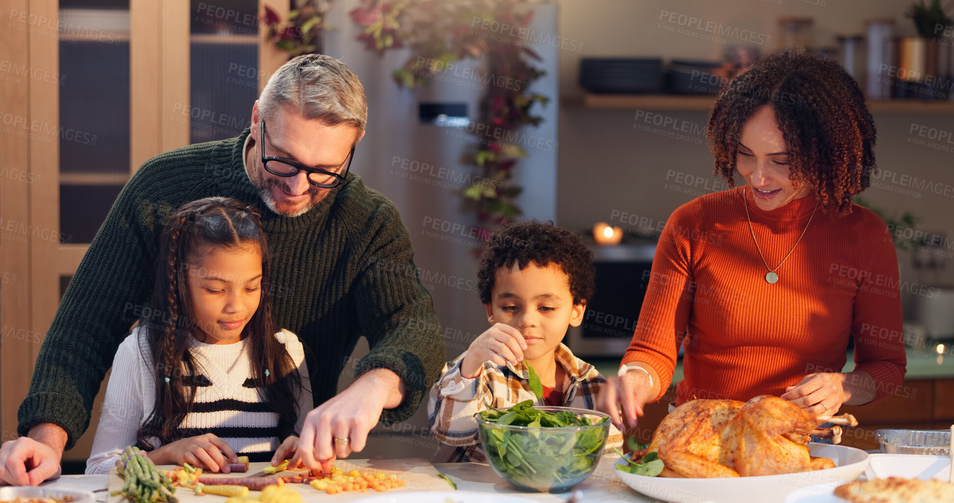 Buy stock photo Happy family, helping and children in cooking for thanksgiving event, food and festive holiday. People, interracial parents and happiness for dinner party, meal prep and gathering in home for bonding