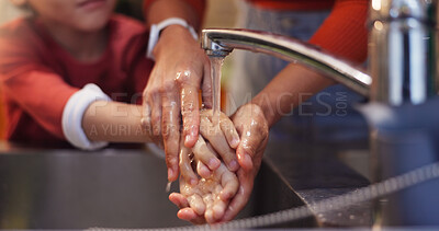 Buy stock photo Child, woman and washing hands in bathroom for health, development and motor skills in home. Kid, mother and help in hygiene for cleaning, education and routine with care, bonding or virus prevention