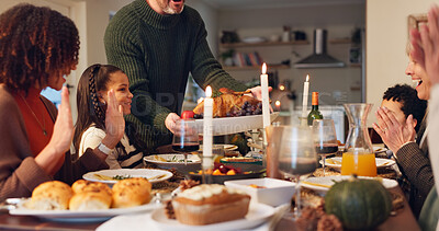 Buy stock photo Big family, serving chicken and thanksgiving with children, holiday and food in home. People, applause and festive celebration at dinner party, reunion and gathering for bonding or event on vacation