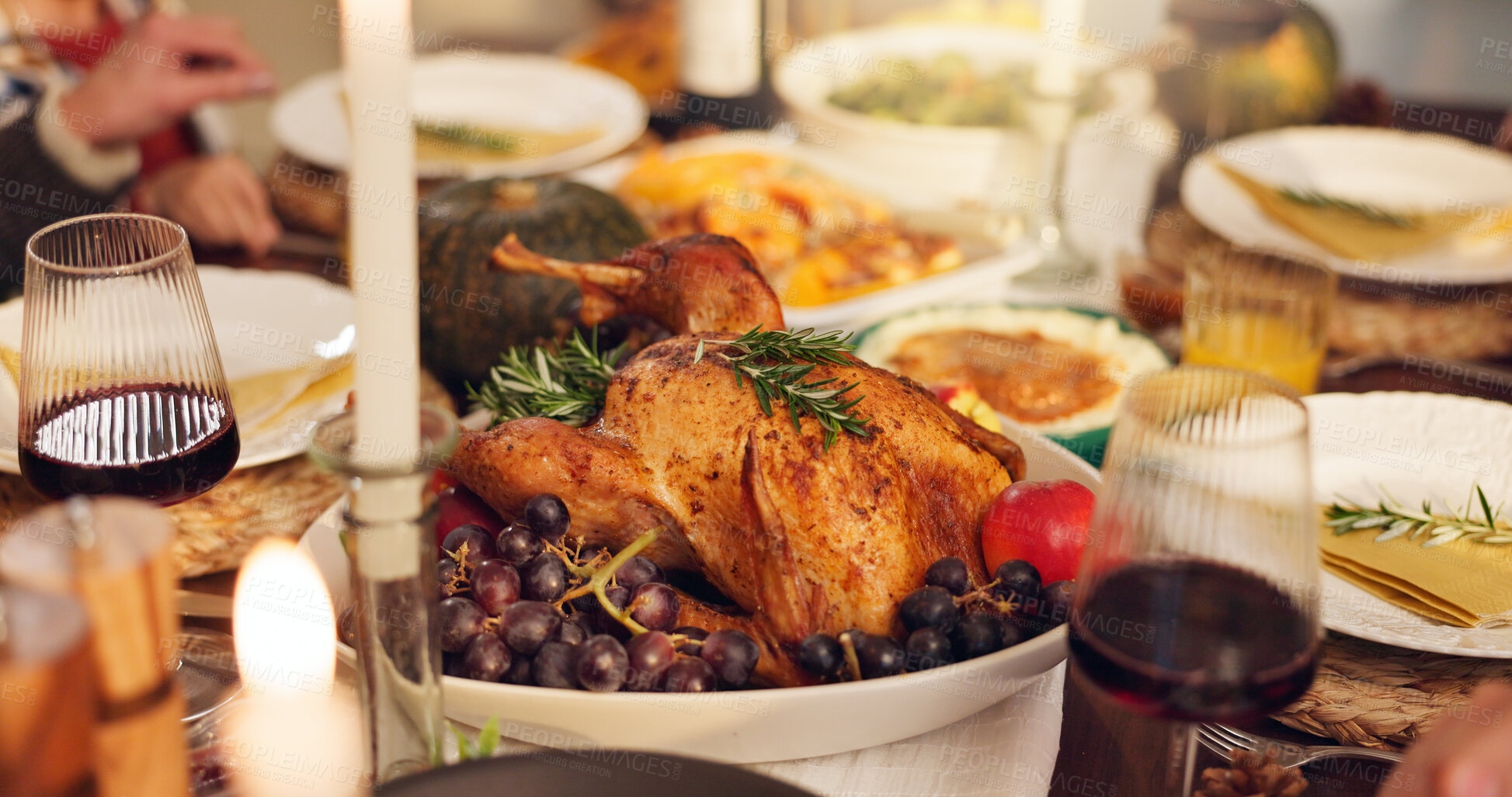 Buy stock photo Chicken, dining table and thanksgiving celebration with wine, festive holiday and food on vacation. Feast, people and family dinner at party, reunion or gathering in bonding together at event in home