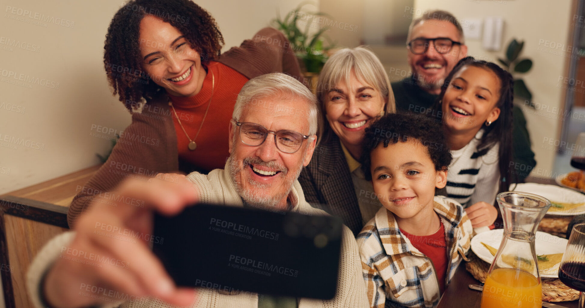 Buy stock photo Thanksgiving, food and selfie of family in home for lunch, supper and Christmas dinner together. Happy, picture and grandparents, parents and kid with memory for festive event, holiday or celebration