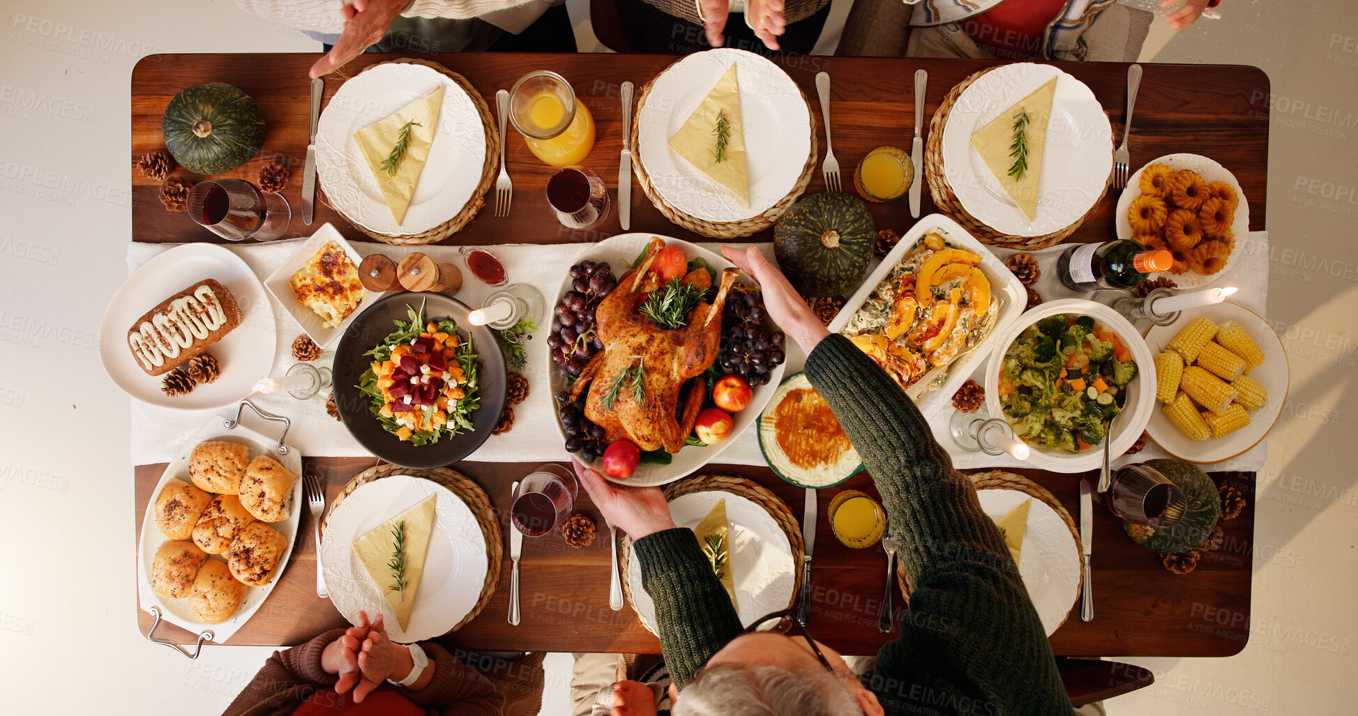 Buy stock photo Above, celebration and thanksgiving dinner with family, festive holiday and food for vacation. Feast, people and chicken in dining room for party, bonding and nutrition for gathering, event and home