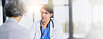 Women, patient and doctor with space, advice at hospital for consulting, service or healthcare. Mature female person, mockup and physician talking for medical assessment, conversation and diagnosis