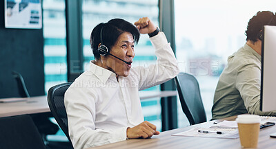 Buy stock photo Man, call centre and celebrate winning in office, sales target and excited for promotion or bonus. Male person, telemarketing success and consultant cheering in Japan, computer and online victory