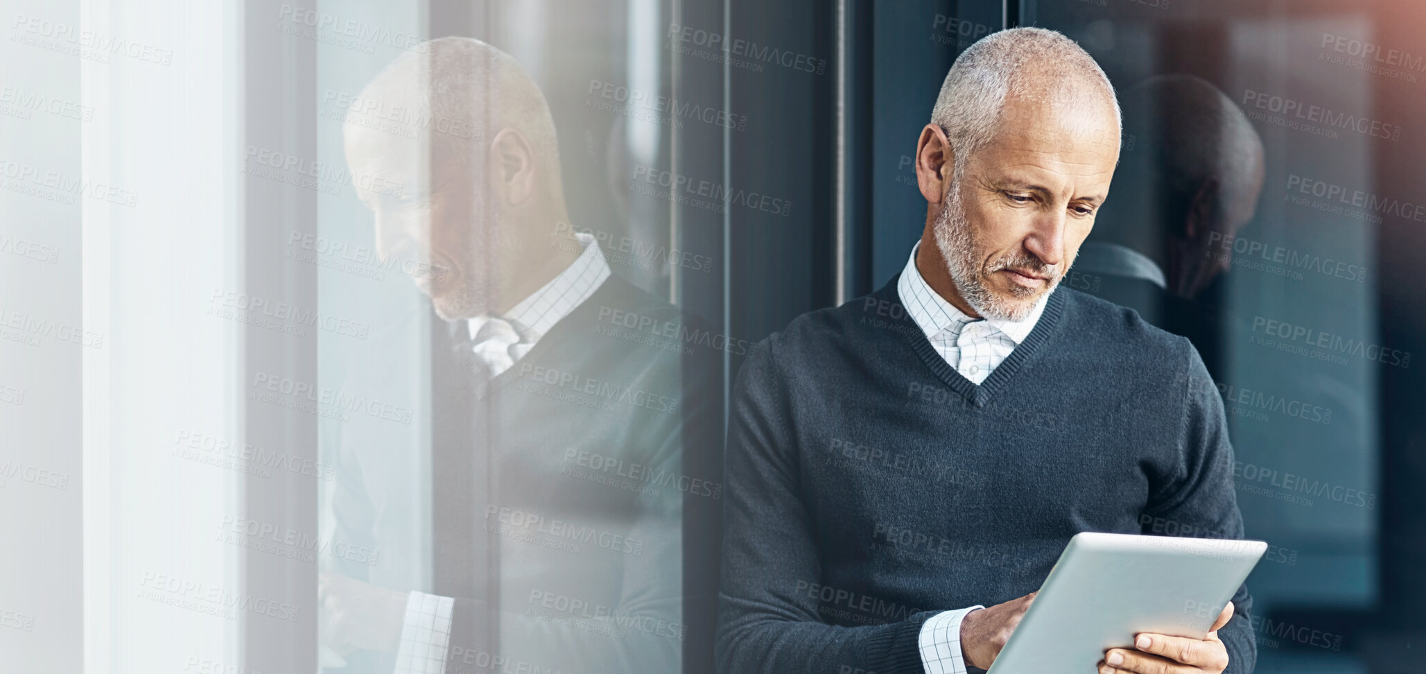 Buy stock photo Mature, business and man with tablet at window of communication, schedule planning and finance report. Male accountant, digital and reading updates of financial email, investment news and negotiation