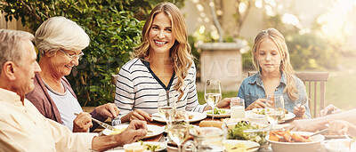 Buy stock photo Grandparents, parents and child at table in garden for festive gathering, traditional dinner and lunch. Family, food and girl with grandpa, grandma and mom for Thanksgiving, celebration and holiday