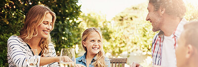 Buy stock photo Mom, dad and kids at patio lunch with smile, bonding and family eating together in backyard. Father, mother and children at table for outdoor garden picnic with food, laughing and love on banner.