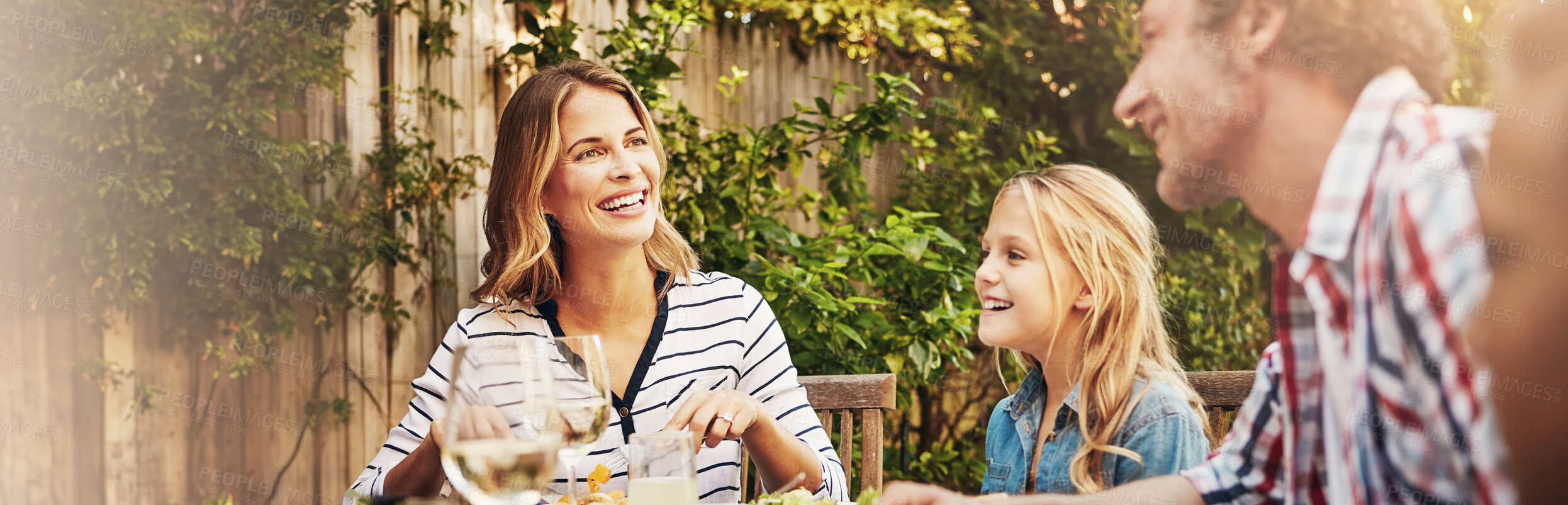 Buy stock photo Mom, dad and children at patio lunch with smile, bonding and family eating together in backyard. Father, mother and kids at table for outdoor garden picnic with food, laughing and love on banner.