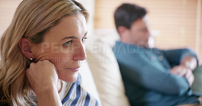 Buy stock photo Annoyed, argument and conflict with couple on sofa in living room of home for marriage frustration. Depression, ignore and loneliness with woman thinking about breakup or divorce in apartment