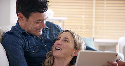 Buy stock photo Happy, couple laugh and tablet on sofa in home with streaming, series and technology with smile. Internet, watching and love of people with app, online and fun on weekend with care and bonding