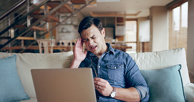 Buy stock photo Man, pain and headache from stress at house with temple massage, burnout crisis and brain fog in lounge. Male person, rest and laptop with migraine from fatigue, anxiety and vertigo in living room