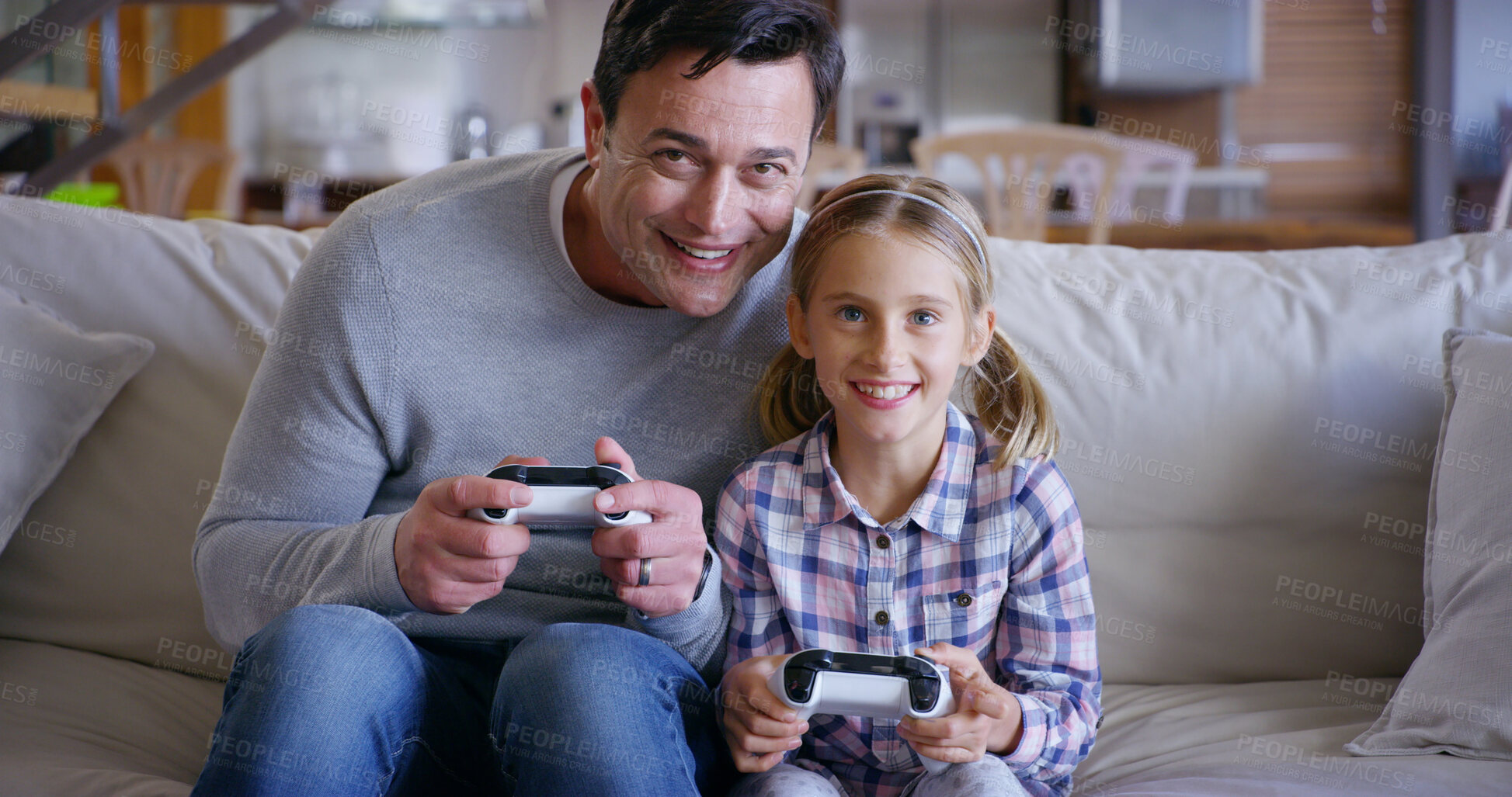 Buy stock photo Home, dad and child with controller, video game and bonding with tech, fun and daughter in house. Lounge, gamer and man with console, kid and subscription for family, electronics and playing