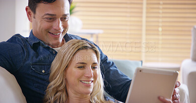 Buy stock photo Happy, couple and tablet in home with video streaming, series and technology with smile from meme. Internet, watching and love of people with app, online and fun together on weekend with care