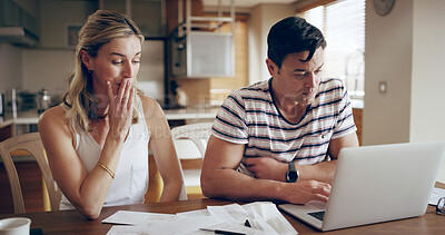 Buy stock photo Couple, finance and laptop with documents in home, reading and planning for tax compliance in morning. Man, woman and paperwork with stress, budget and thinking with worry by computer at apartment